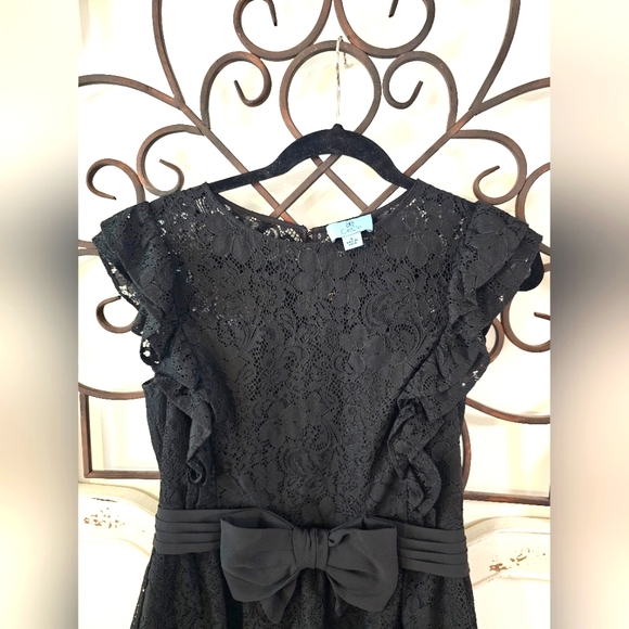 Black CeCe Lace Peplum Top with ruffled sleeves size S with a Bow accent - Picture 3 of 8